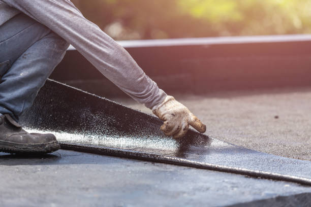 Professional Basement Waterproofing technician working in Hammondsport, NY